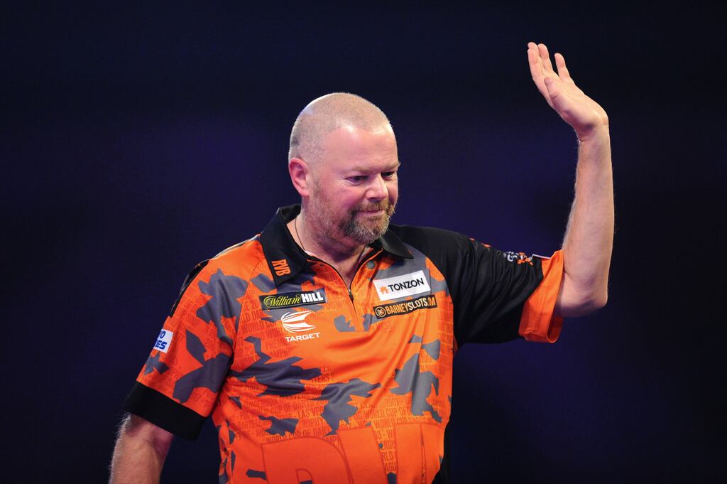 Raymond van Barneveld of the Netherlands waves to fans as he walks off the stage after defeat in his first round match against Darin Young of the US during the 2020 World Darts Championship at Alexandra Palace, London, on December 14th, 2019. Photograph: Alex Burstow/Getty Images