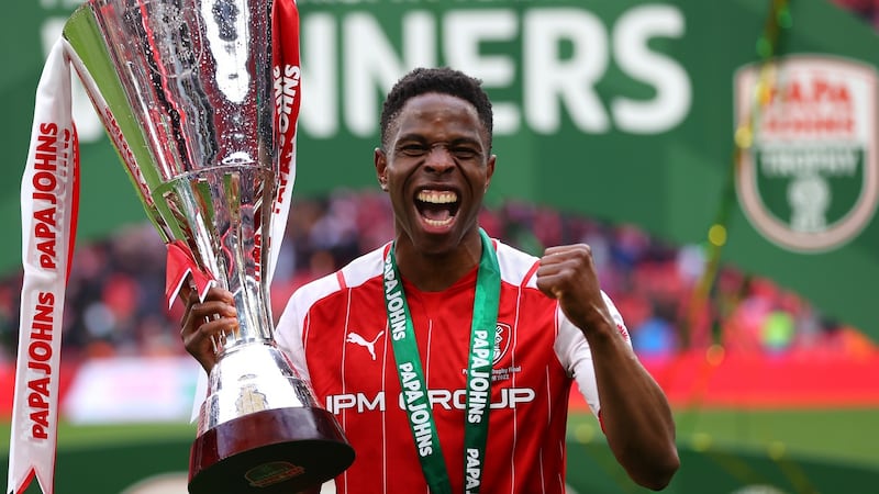 Irish international Chiedozie Ogbene celebrates with the Papa John’s Trophy following of Rotherham United extra-time victory over Sutton United at Wembley Stadium. Photograph: Catherine Ivill/Getty Images