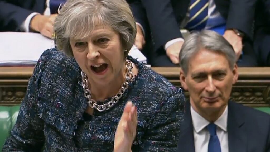 British prime minister Theresa May and chancellor of the exchequer Philip Hammond: Hammond’s humiliation sends an ominous message that May’s government can fold at the first sign of pressure. Photograph: AFP/Getty Images