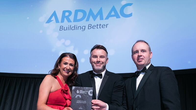 Kevin O'Driscoll, director Partner Programmes, BusinessRiver, presents the COVID-19 Crisis Response award to Lisa Jennings & David Kavanagh, Adrmac.