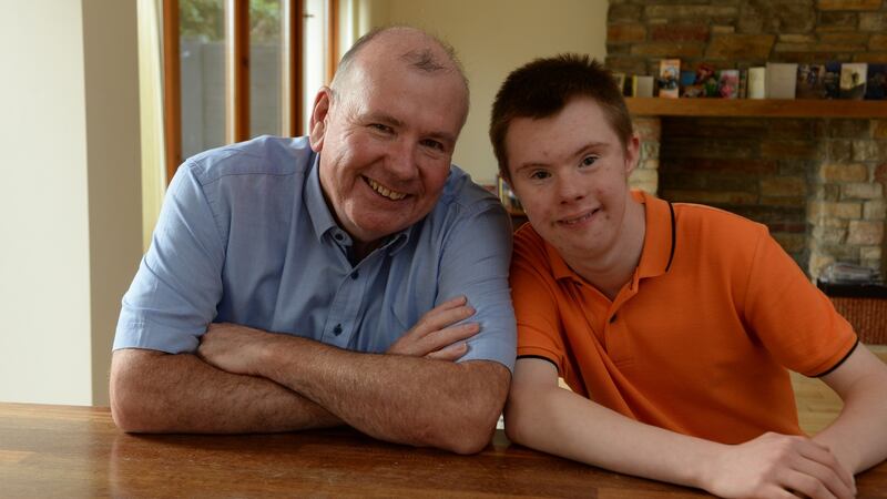 Colin Fogarty and son Conor at home in Sutton. Photograph: Cyril Byrne