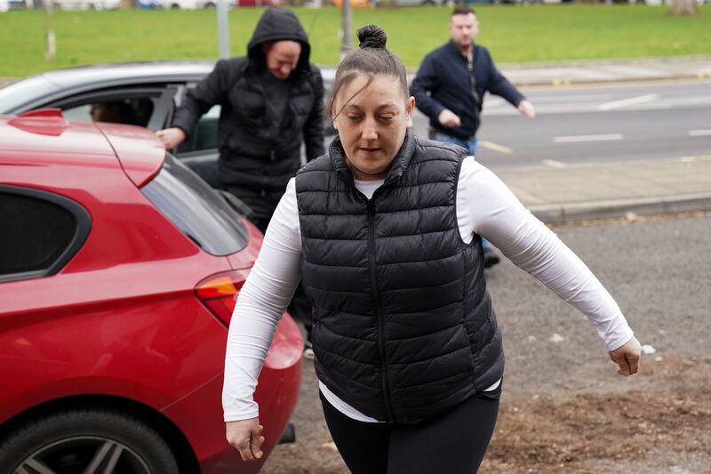 Sarah Lloyd-Jones arrives at Swansea Crown Court, to be sentenced along with Alun Titford, for manslaughter by gross negligence of their obese teenage daughter who was found dead in "squalor". Photograph: PA