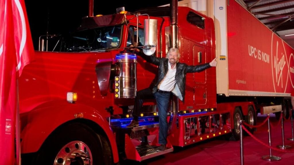Richard Branson makes his entrance via truck at last week’s UPC-to- Virgin Media launch event at the RDS. Photograph: Brenda Fitzsimons