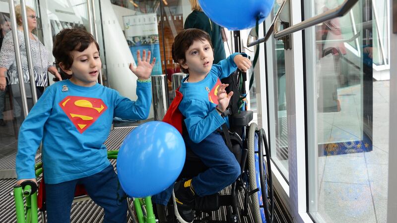 Former conjoined twins Hussein (left) and Hassan Benhaffaf, at the launch of an  Irish Wheelchair Association fundraising campaign  in 2014. File photograph: Eric Luke/The Irish Times