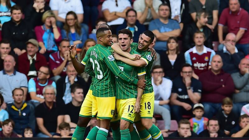 Robbie Brady of Norwich City celebrates scoring the opening goal of the Premier League game against West Ham at Upton Park. Photograph: Justin Setterfield/Getty Images