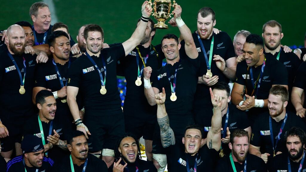 Richie McCaw and Dan Carter hold aloft the Webb Ellis Cup after New Zealand’s win over Australia in the World Cup Final at Twickenham. Photograph: Stu Forster/Getty Images