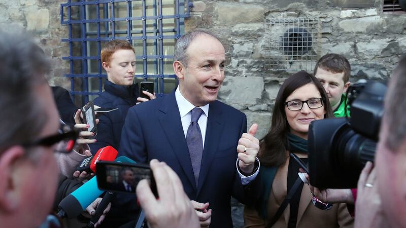Fianna Fáil leader Micheál Martin on the general election campaign trail with party candidate Catherine Ardagh in Dublin South-Central. Photograph: Niall Carson/PA Wire