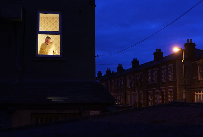 A ROOM WITH A VIEW: Tony McGrath (76) "cocooning" against coronavirus at his home in Drumcondra, Dublin. Cocooning, which involves vulnerable persons minimising all interaction with other people, is now required for everyone in the State over the age of 70. Photograph: Fran Veale