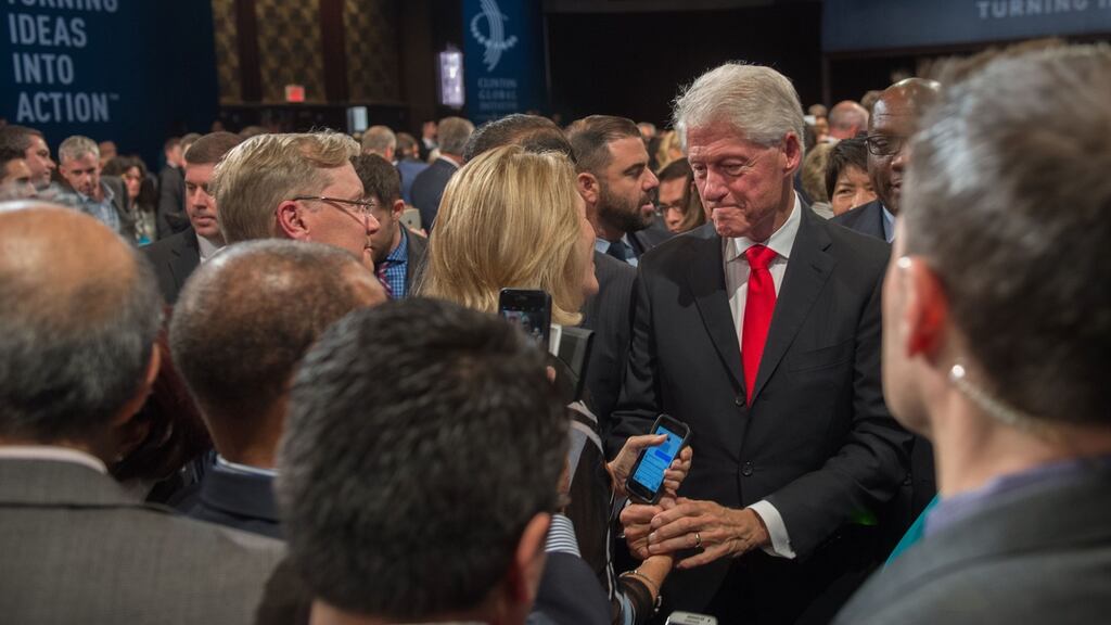 Former president Bill Clinton greets people following his speech at the closing session of the Clinton Global Initiative in New York. Photograph: AFP Photo/Bryan R. Smith