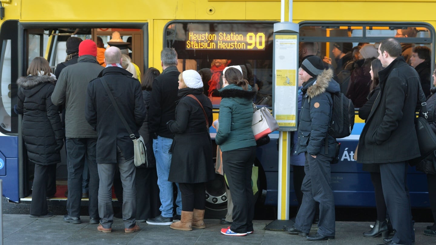 Commuters queue for a bus for the city centre as Luas drivers embark on a two-day strike in search of higher pay. Photograph: Alan Betson/The Irish Times