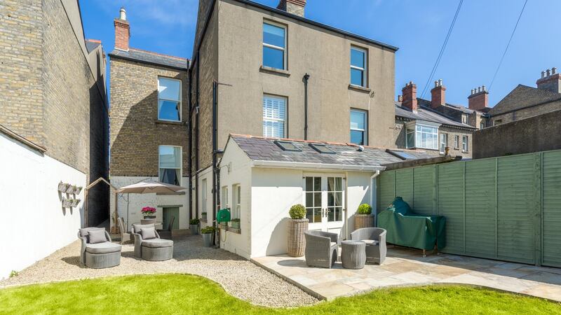 The property has two storey to the front and three storeys to the back