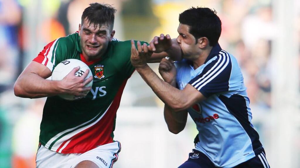Renewing acquaintances: Mayo’s Aidan O’Shea and Cian O’Sullivan of Dublin.