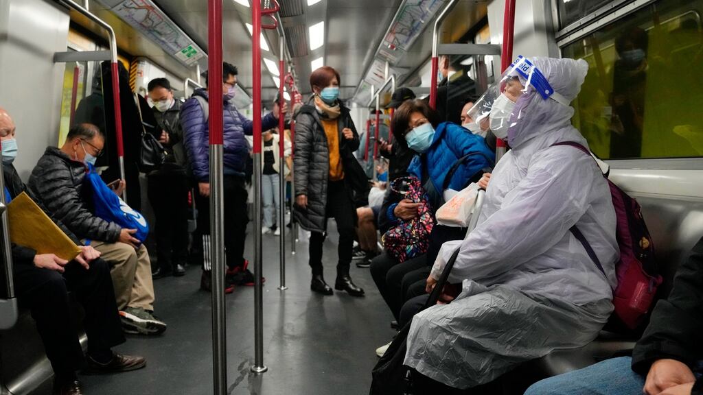 A train in Hong Kong: the city has a zero-Covid strategy. Photograph: AP Photo/Kin Cheung