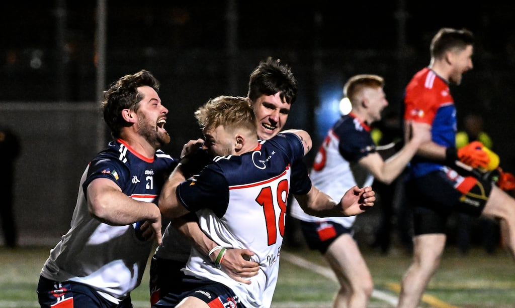 New York’s Niall Madine, Killian Butler and Mikey Brosnan celebrate their victory in the penalty shootout. Photograph: Emily Harney/Inpho