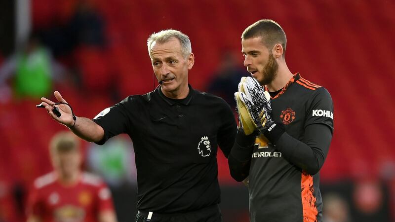 Martin Atkinson’s two controversial decisions allowed Wilfried Zaha to make it 2-0 from the penalty spot. Photograph: Shaun Botterill/PA