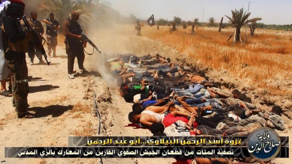 Atrocity: a scene from the video apparently showing Isis executing Iraqi soldiers
