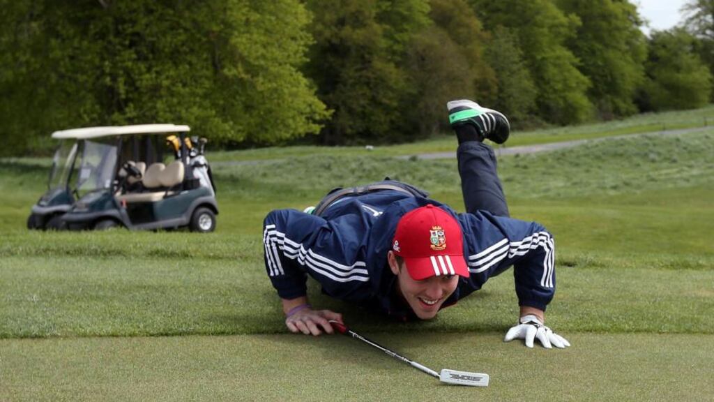 Wales’ George North gets in some golf practice during yesterday’s Lions Down Day at Carton House, Maynooth, yesterday. Photograph: Inpho