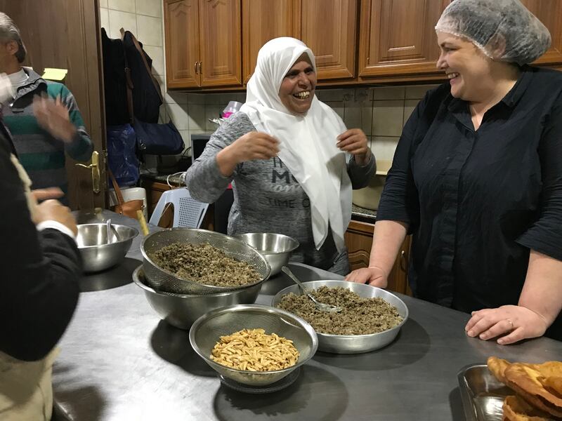 Anissa Umfadi from Damascus makes Kibbeh with Jess in the town of Al-Salt near Amman, Jordan