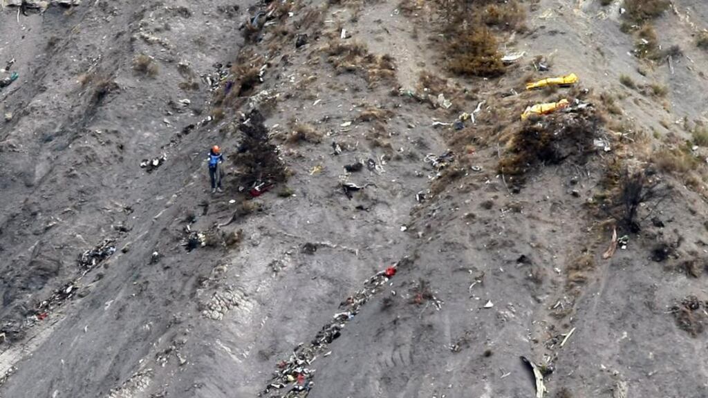 Rescue workers work at the site of the Germanwings Airbus A320 crash. Video from inside the plane’s cabin shortly before the crash has reportedly been found on a memory card at the site. Photograph: Claude Paris/EPA