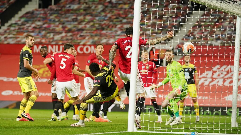 Michael Obafemi gets ahead of Victor Lindelof to score Southampton’s equaliser in the 2-2 draw with Manchester United. Photo: Dave Thompson/NMC/Pool
