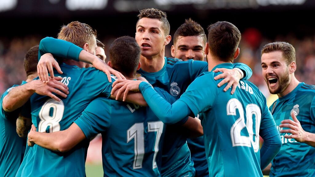 Cristiano Ronaldo and teammates celebrate Toni Kroos’ goal. Photograph: Getty Images