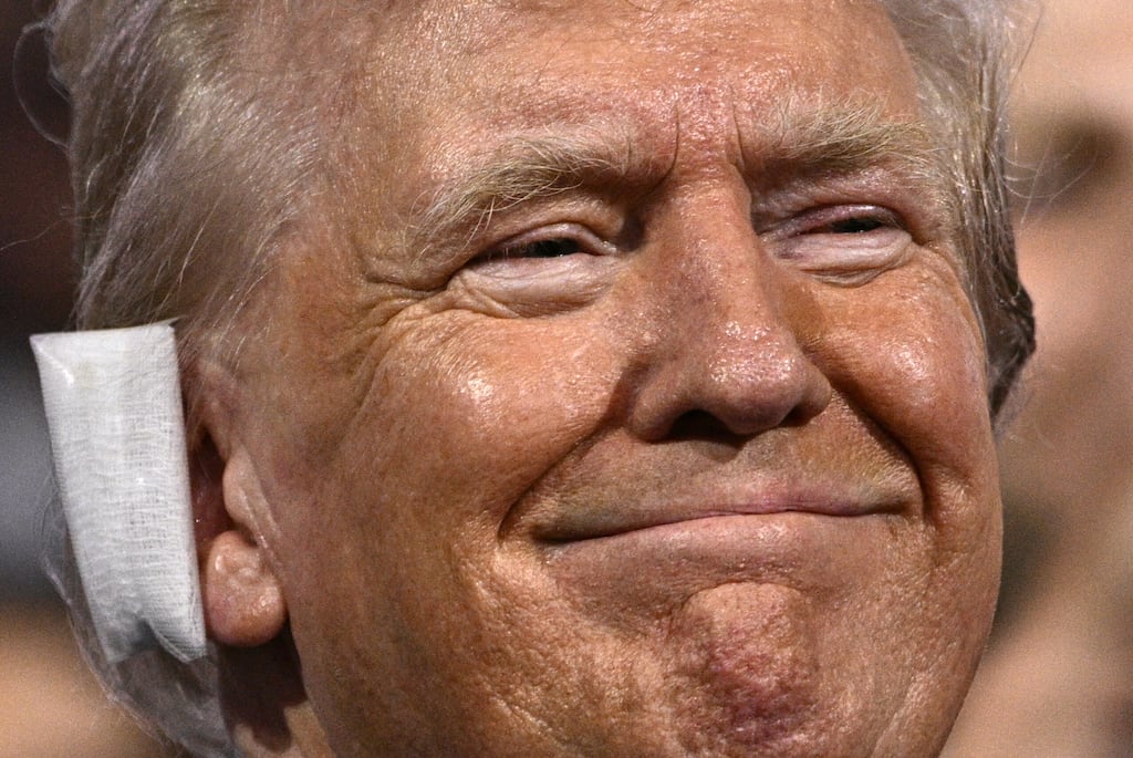 Donald Trump with a bandage on his ear following last weekend's assassination attempt. Photograph: Brendan Smialowski/AFP