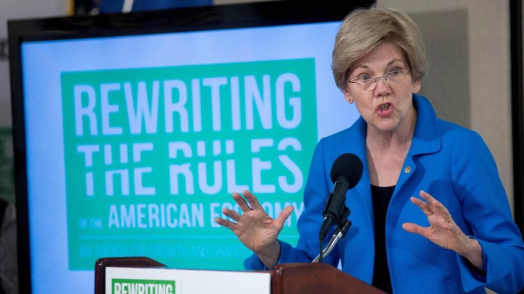 Senator Elizabeth Warren, a Democrat from Massachusetts, speaking at the National Press Club in Washington yesterday. Ms Warren says Wall Street recklessness caused the 2008 financial crisis Photograph: Bloomberg