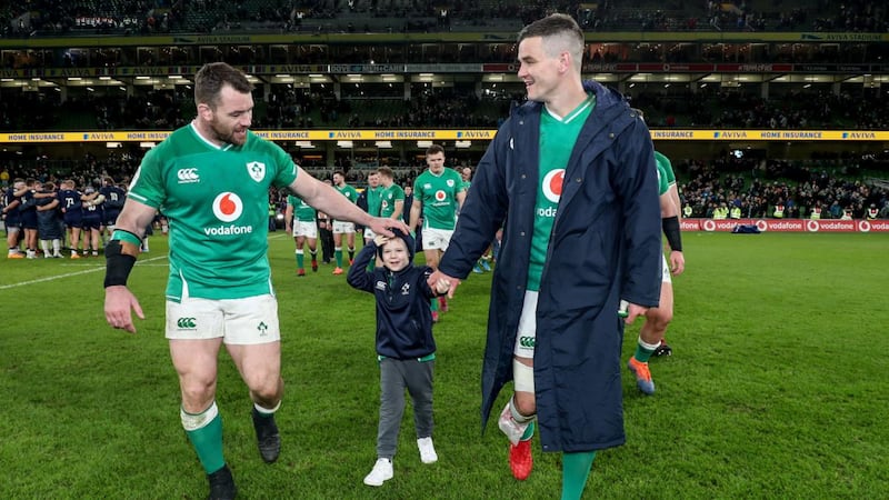 Cian Healy with Jonathan Sexton and his son Luca after the Scotland Six Nations game back in February. Photograph: Dan Sheridan/Inpho