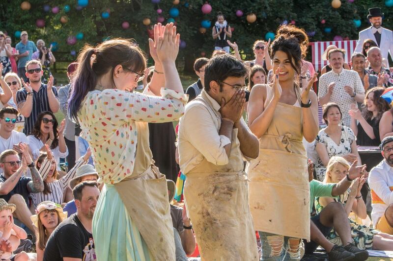 Fellow finalists Kim-Joy (left) and Ruby celebrate Rahul (centre) winning The Great British Bake Off 2018 Photograph: C4/Love Productions/Mark Bourdillon/PA Wire
