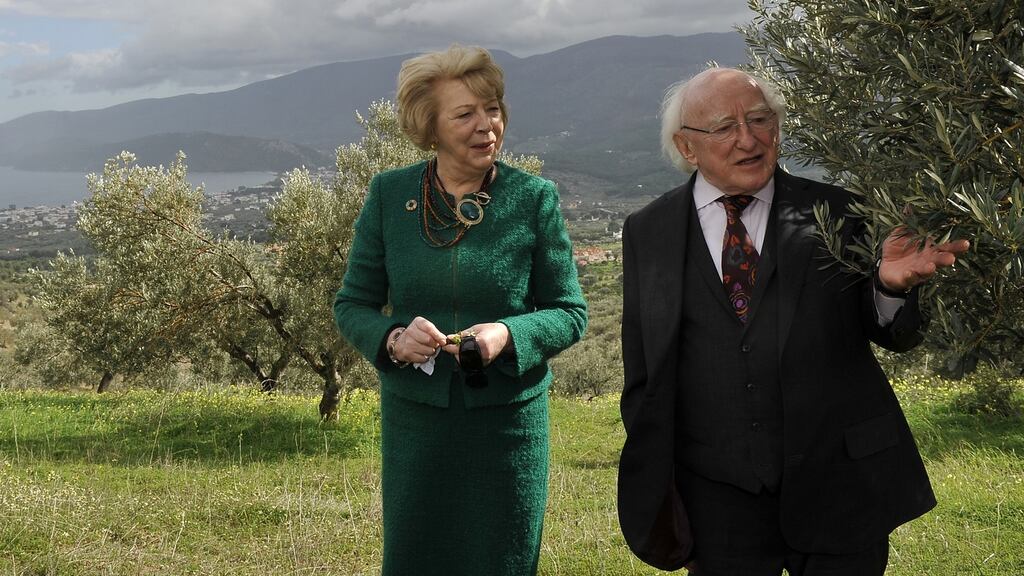 President of Ireland Michael Higgins and his wife, Sabina, visit an olive grove near Corinth during his official visit to Greece in February last year. Photograph: Valerie Gache/AFP via Getty