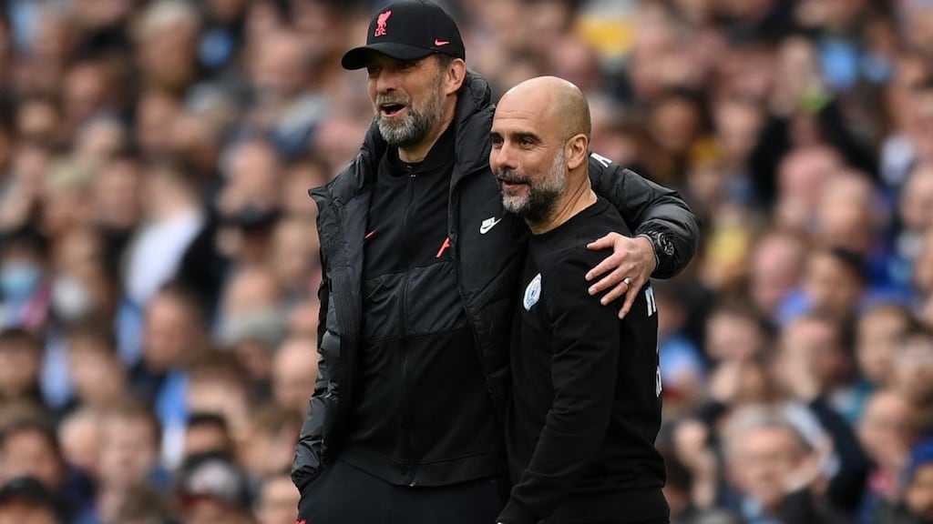 Manchester City’s Catalan manager Pep Guardiola with Liverpool boss Jurgen Klopp during their team’s draw at the Etihad on Sunday. Photograph: Michael Regan/Getty Images