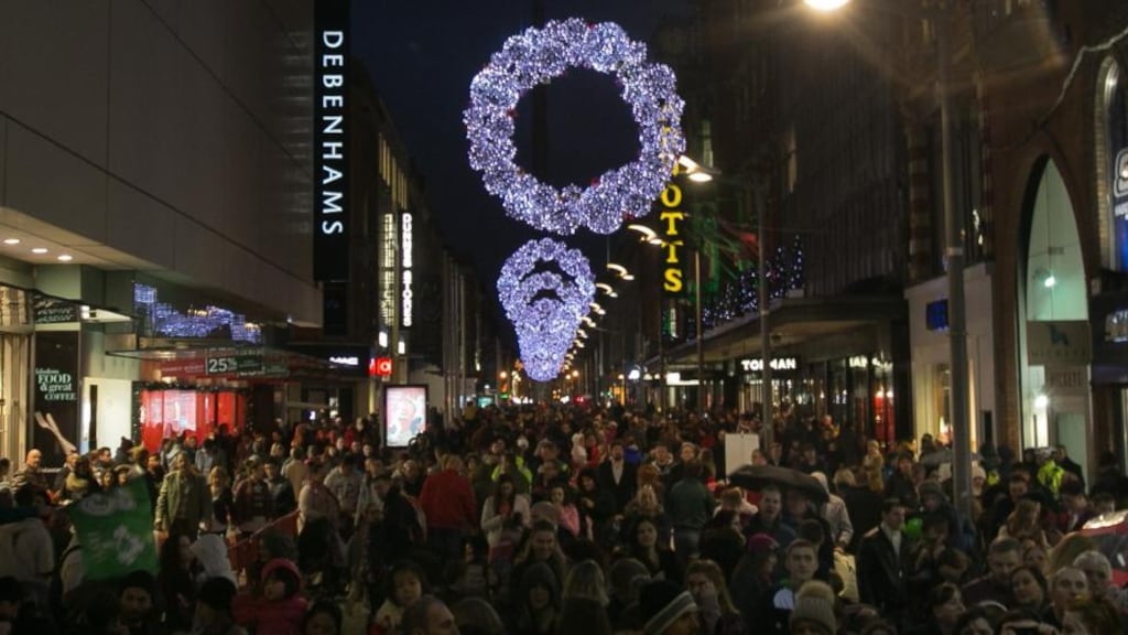 Shopper on Henry Street, Dublin. “The power of consumerism to skew societal values is no better demonstrated than in the run-up to Christmas.” Photograph: Gareth Chaney Collins