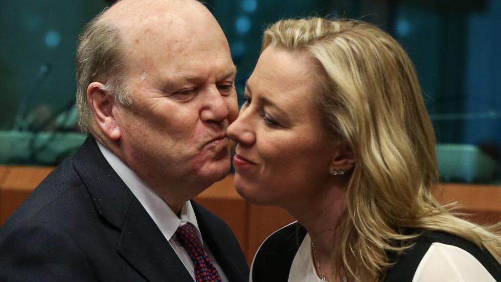 Minister for Finance Michael Noonan and Finnish finance minister Jutta Urpilainen chat at the start of eurogroup finance ministers’ meeting in Brussels yesterday. Photograph: EPA/Julien Warnand