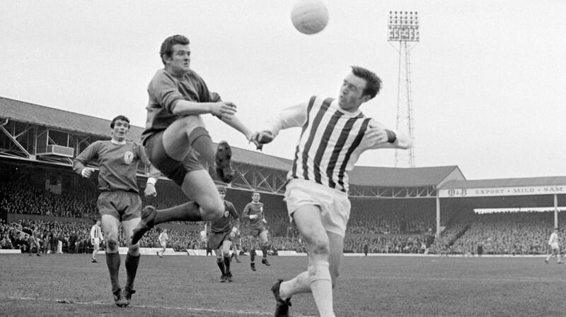West Bromwich Albion centre-forward Jeff Astle challenging for a high ball with Liverpool goalkeeper Tommy Lawrence in 1968. The brains of former footballers should be donated for research to allow studies into the health effects of heading the ball, the daughter of Mr Astle said. Photograph: PA Wire