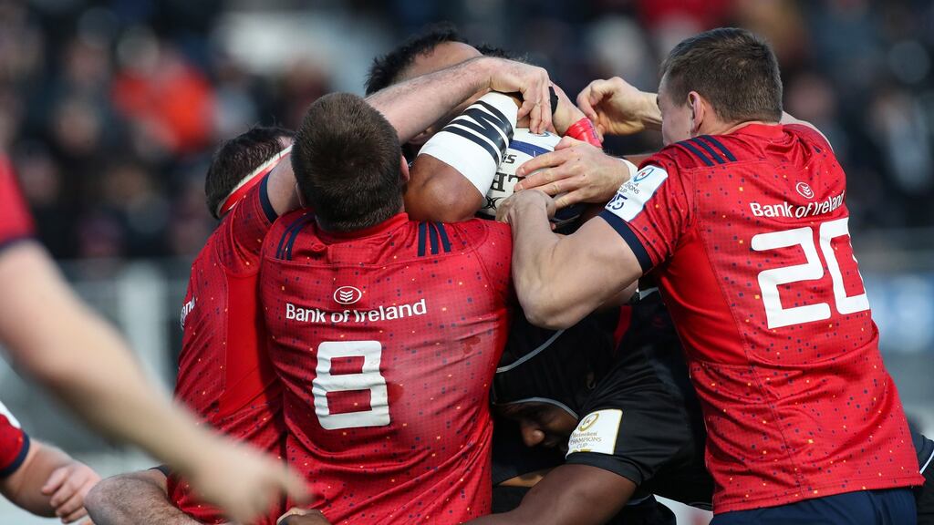 Munster’s CJ Stander and Jack O’Donoghue compete for the ball with Billy Vunipola. Photo: Billy Stickland/Inpho