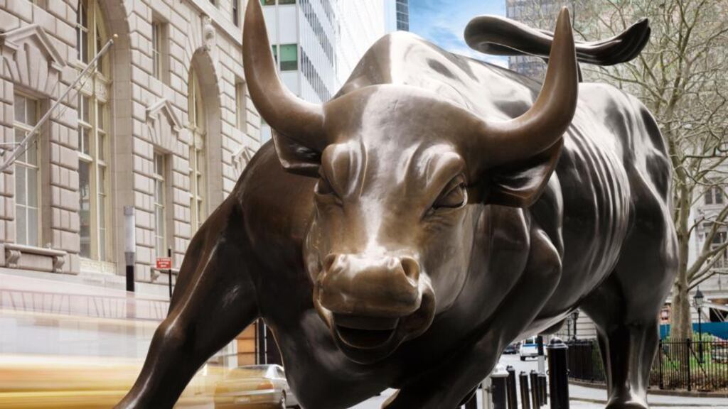 The ‘Charging Bull’ sculpture, known as the Wall Street Bull, which sits in Bowling Green Park near Wall Street in New York. US regulators are pressing banks for rapid improvements in risk assessment. Photographer: Eightfish