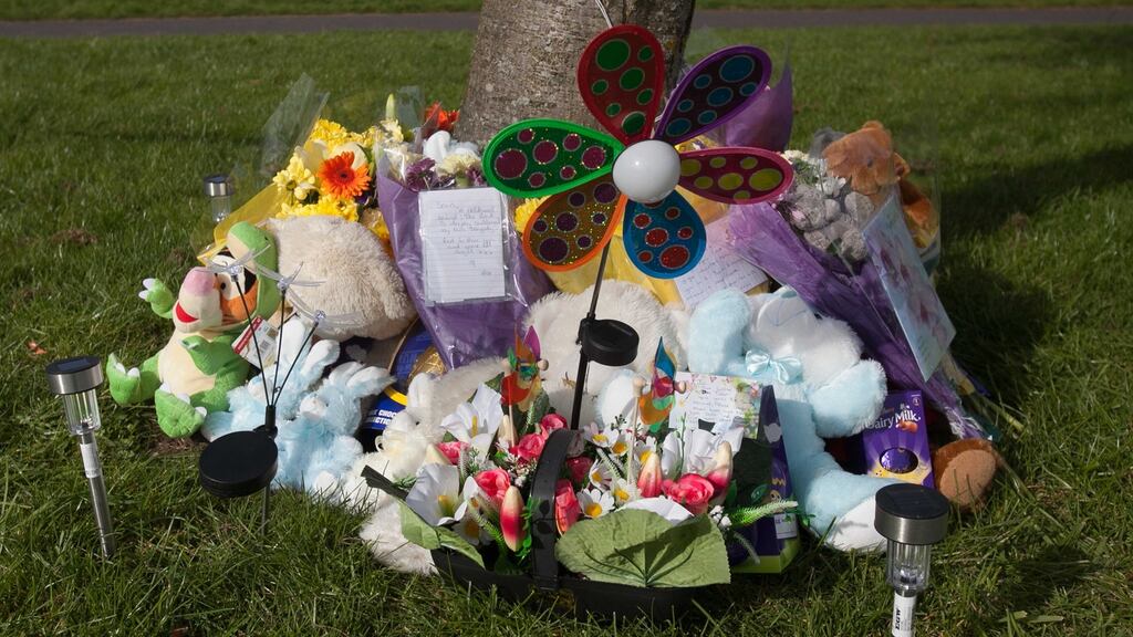 Flowers and messages of sympathy laid at Ashington estate, Dublin, close to the scene where the bodies of Sean Sweeney, who was in his 30s, and his three-year-old son Tyler Joyce were found. Photograph: Gareth Chaney/Collins