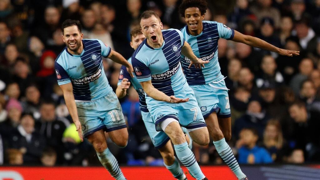 Wycombe Wanderers’ Garry Thompson celebrates scoring his side’s third goal against Tottenham at White Hart Lane in the FA Cup fourth round. Photograph: Darren Staples/Reuters