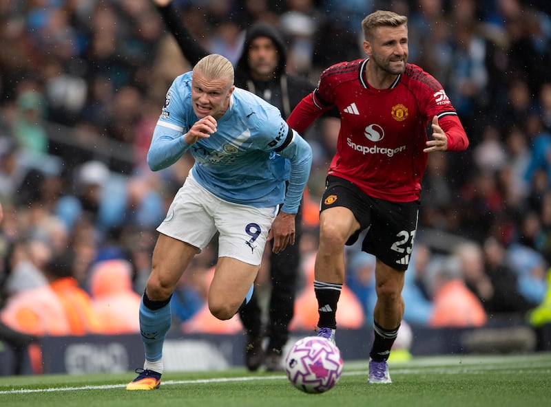 Erling Haaland outpaces Manchester United's Luke Shaw, a feat which may or may not be more impressive than outpacing Manchester United's Harry Maguire. Photograph: Visionhaus/Getty Images