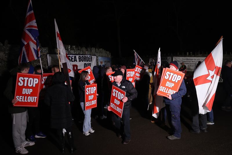Protesters outside Larchfield Estate on Monday night. Photograph: Liam McBurney/PA Wire
