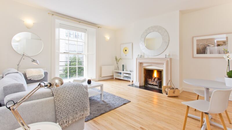 Livingroom with open fireplace at apartment No 2, 11 Harcourt Terrace, Dublin 2