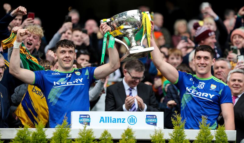 Kerry's David Clifford and Joe O’Connor lift the league trophy after last year's win over Mayo in the final. Photograph: Evan Treacy/Inpho