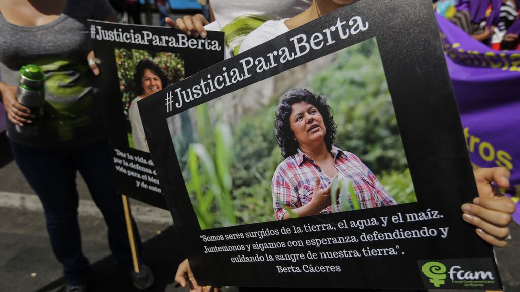 A woman holds a picture of Honduran Human Rights activist Berta Caceres Flores who was killed at her home on March 3. Photograph: Inti Ocon/AFP/Getty Images