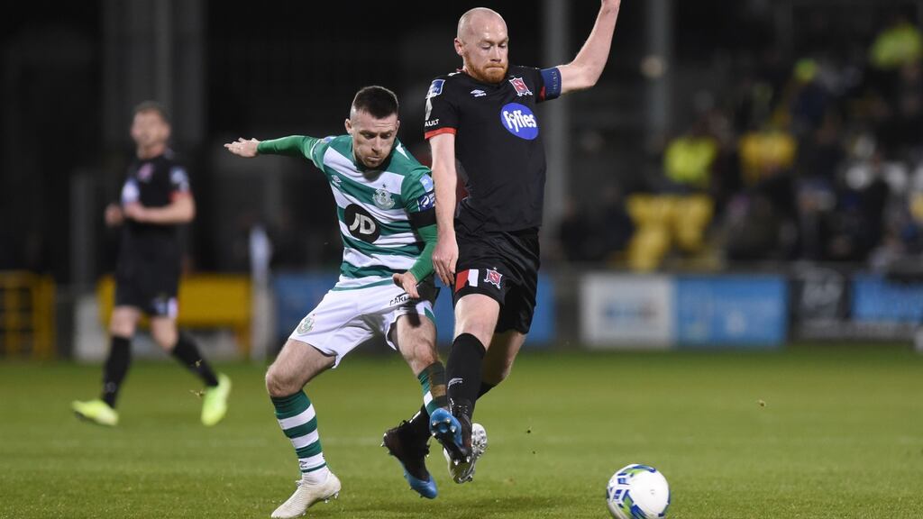 Dundalk’s Chris Shields and Jack Byrne of Shamrock Rovers vie for the ball during their clash before the shutdown. Photo: Ciaran Culligan/Inpho