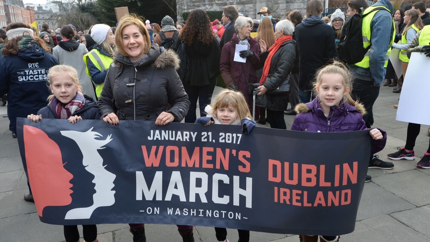 Alana Kirk with her children Daisy (11), Poppy (9) and Ruby (6), taking part in the Women’s March in Dublin. Photograph: Dara Mac Dónaill