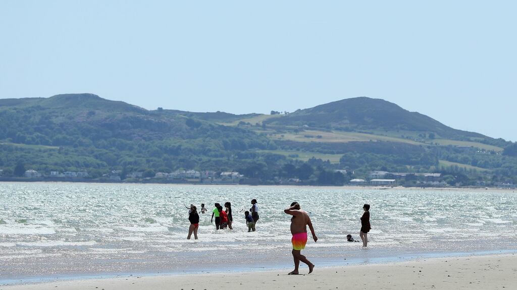 Portmarnock beach on Friday. The warm weather is set to continue into next week. Photograph: Brian Lawless/PA Wire