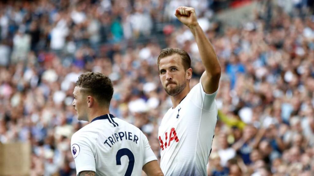 Harry Kane celebrates after scoring Tottenham’s third against Fulham. Photograph: Julian Finney/Getty