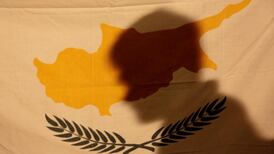 Cypriot president in Brussels for showdown talks with troika