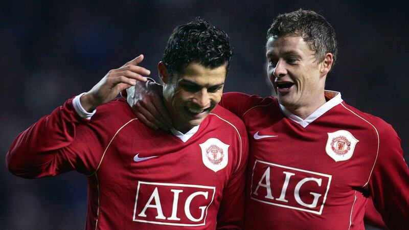 Cristiano Ronaldo with his new manager Ole Gunnar Solskjaer in December 2006. Photograph: Paul Ellis/Getty/AFP