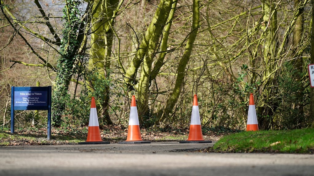 Traffic cones block the entrance to Cransley School in Northwich, Cheshire, England, which is closed for the rest of the week for a ‘deep clean’ after pupils and teachers came back from the Lombardy region. Photograph: Christopher Furlong/Getty Images